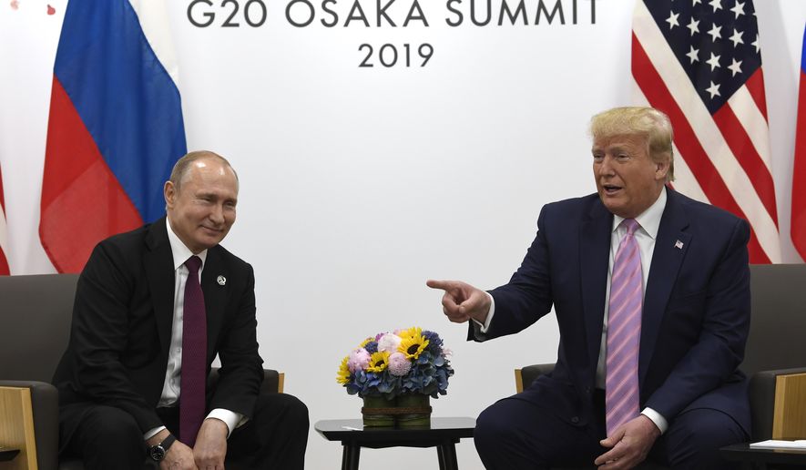 President Donald Trump, right, meets with Russian President Vladimir Putin during a bilateral meeting on the sidelines of the G-20 summit in Osaka, Japan, Friday, June 28, 2019. (AP Photo/Susan Walsh)