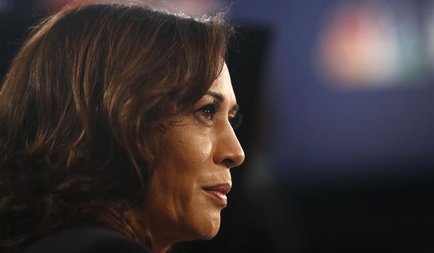 Democratic presidential candidate Sen. Kamala Harris, D-Calif., listens to questions in the spin room after the Democratic primary debate hosted by NBC News at the Adrienne Arsht Center for the Performing Art, Thursday, June 27, 2019, in Miami. (AP Photo/Brynn Anderson)
