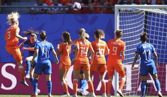 Netherlands&#39; Stefanie Van Der Gragt, left, scores her side&#39;s second goal during the Women&#39;s World Cup quarterfinal soccer match between Italy and the Netherlands in Valenciennes, France, Saturday, June 29, 2019. (AP Photo/Francisco Seco)