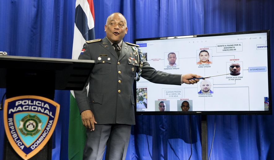 Col. Frank Felix Duran Mejia, spokesperson for the Dominican National Police, leads a press conference regarding the investigation into the shooting of former Boston Red Sox baseball player David Ortiz, in Santo Domingo, Dominican Republic, Sunday, June 30, 2019. Ortiz was shot at a bar in the Dominican Republic on June 9. (AP Photo/Tatiana Fernandez)