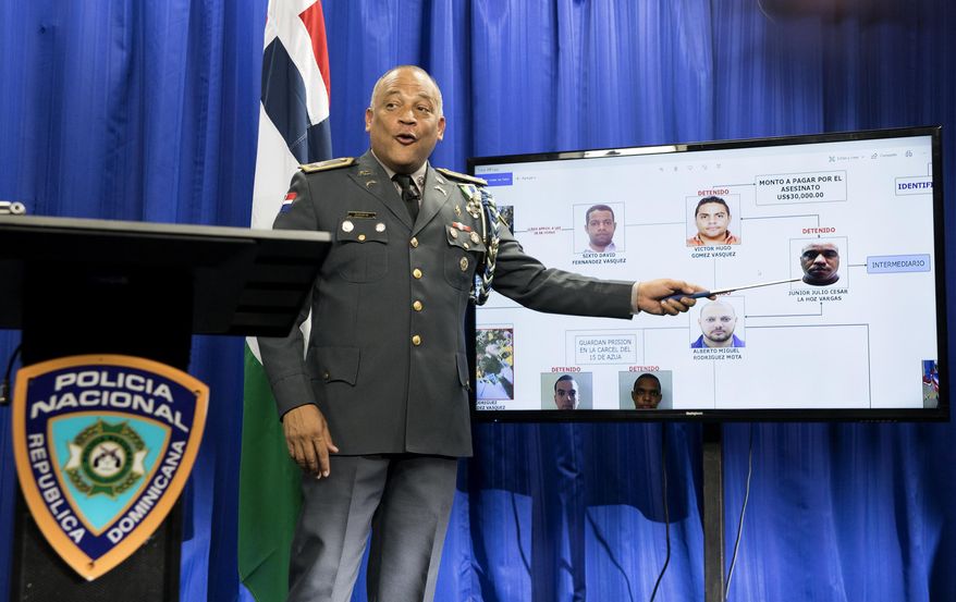 Col. Frank Felix Duran Mejia, spokesperson for the Dominican National Police, leads a press conference regarding the investigation into the shooting of former Boston Red Sox baseball player David Ortiz, in Santo Domingo, Dominican Republic, Sunday, June 30, 2019. Ortiz was shot at a bar in the Dominican Republic on June 9. (AP Photo/Tatiana Fernandez)