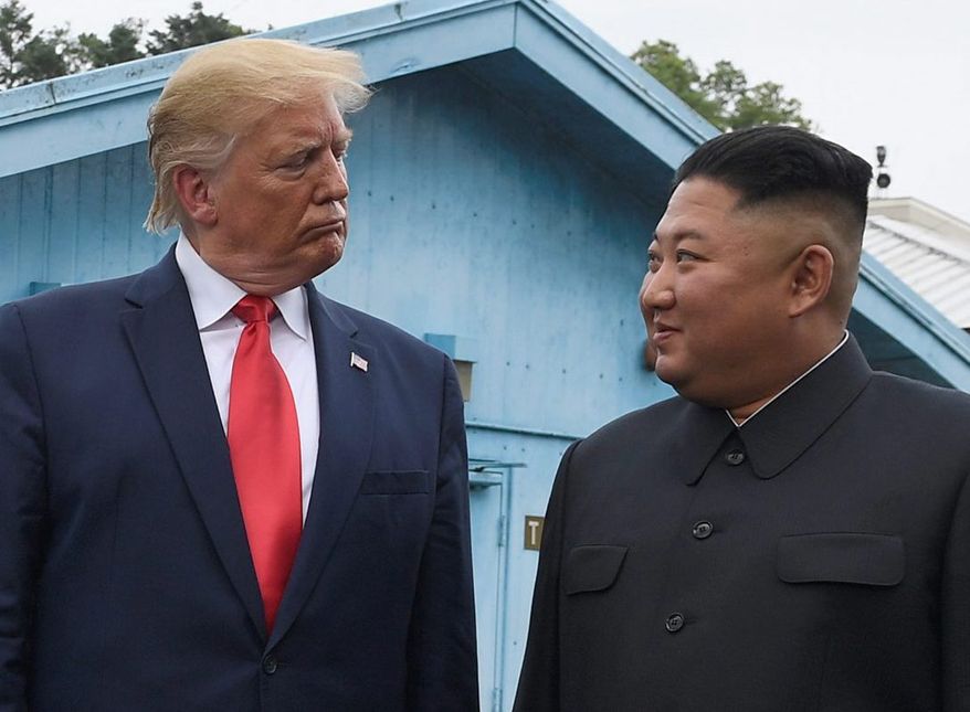 President Donald Trump meets with North Korean leader Kim Jong-un at the border village of Panmunjom in Demilitarized Zone, South Korea, Sunday, June 30, 2019. (Associated Press) **FILE**