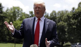 In this June 26, 2019, file photo, President Donald Trump speaks to reporters on the South Lawn of the White House in Washington. (AP Photo/Evan Vucci) ** FILE **