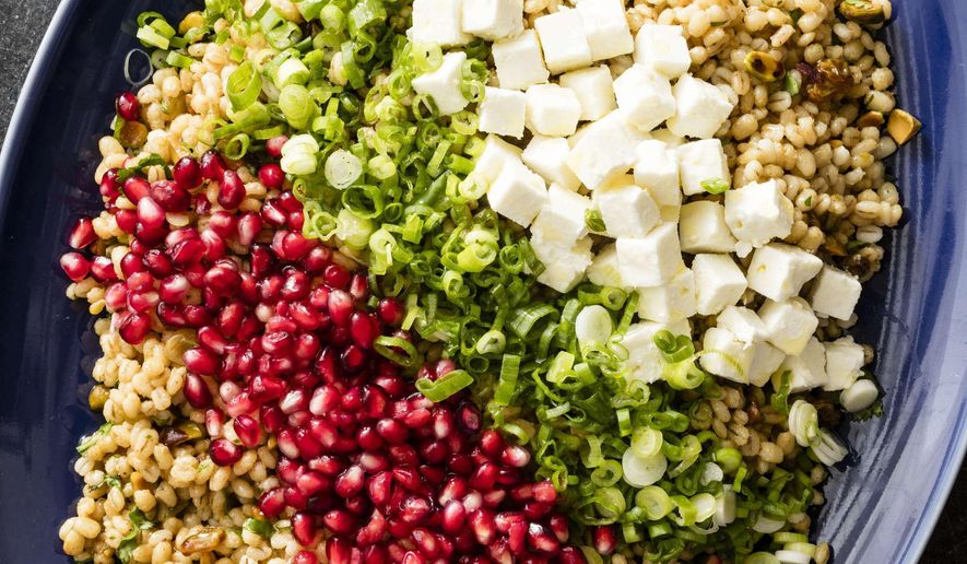This undated photo provided by America's Test Kitchen in June 2019 shows an Egyptian Barley Salad in Brookline, Mass. This recipe appears in the cookbook “Multicooker Perfection.” (Daniel J. van Ackere/America's Test Kitchen via AP)