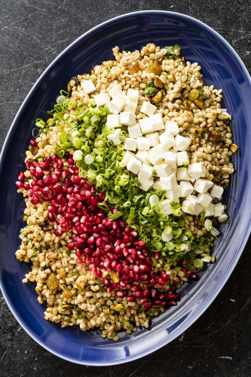 This undated photo provided by America's Test Kitchen in June 2019 shows an Egyptian Barley Salad in Brookline, Mass. This recipe appears in the cookbook “Multicooker Perfection.” (Daniel J. van Ackere/America's Test Kitchen via AP)