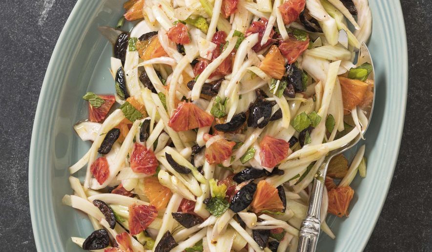 This undated photo provided by America's Test Kitchen in June 2019 shows Fennel, Orange and Olive Salad in Brookline, Mass. This recipe appears in the cookbook “Tasting Italy.” (Daniel J. van Ackere/America's Test Kitchen via AP)