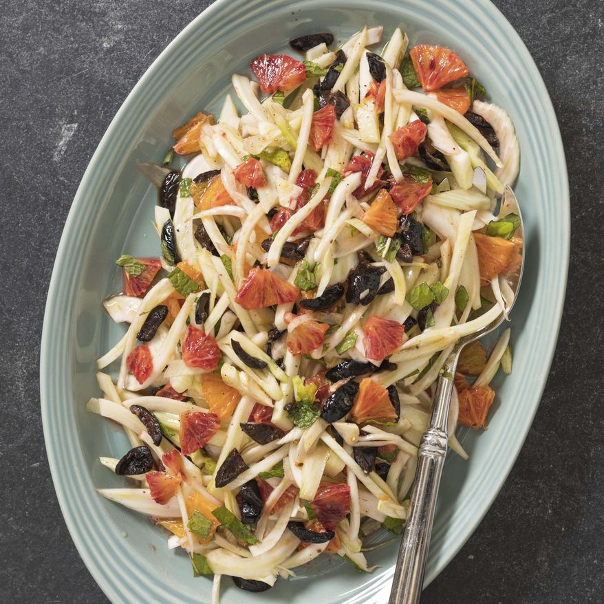 This undated photo provided by America's Test Kitchen in June 2019 shows Fennel, Orange and Olive Salad in Brookline, Mass. This recipe appears in the cookbook “Tasting Italy.” (Daniel J. van Ackere/America's Test Kitchen via AP)