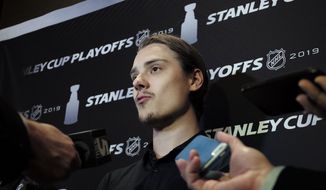 FILE - In this May 8, 2019, file photo, Carolina Hurricanes&#39; Sebastian Aho  faces reporters during a media availability in Boston. The Montreal Canadiens have tendered an offer sheet to Carolina Hurricanes restricted free agent forward Sebastian Aho. The offer sheet is worth $42.27 million over five years, an annual salary cap hit of $8.54 million. If Carolina does not match it, the Canadiens must send a first-, second- and third-round pick to the Hurricanes.It&#39;s the first offer sheet in the NHL since 2013. (AP Photo/Steven Senne, File)