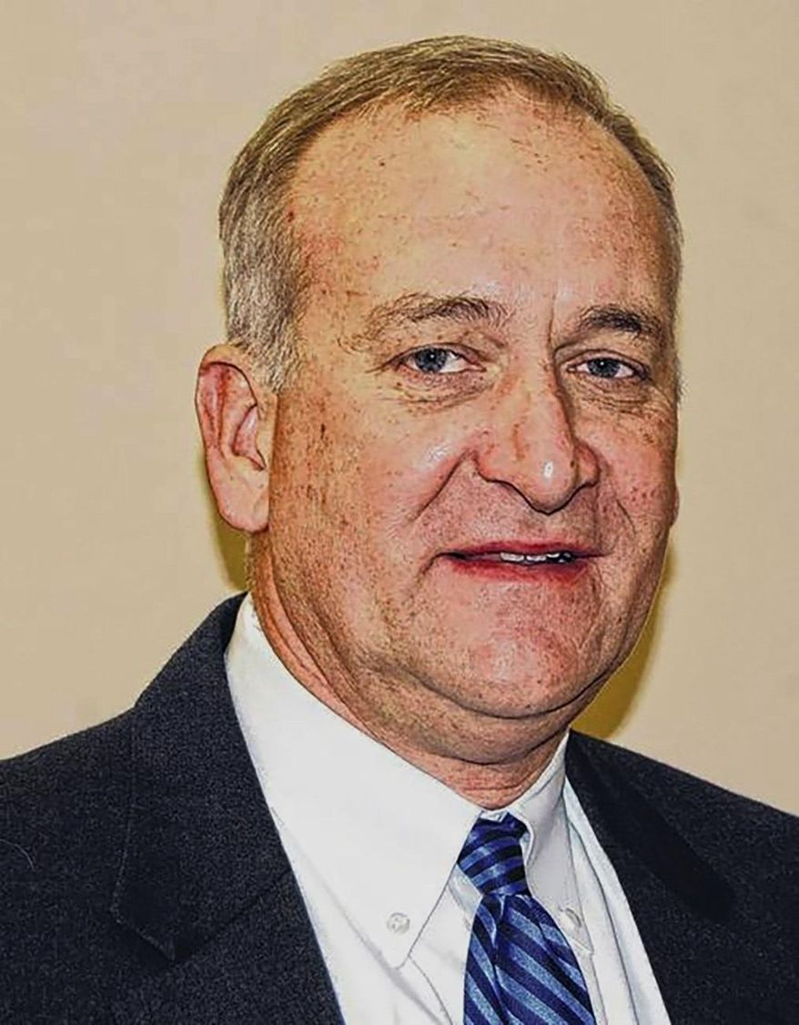 In this undated photo released by the Robesonian, former prosecutor Johnson Britt is shown in N.C. Britt has been appointed to a third term on a fact-finding commission that reviews claims of innocence from North Carolina residents convicted of crimes. But this time, he'll be representing criminal defense attorneys, some of whom say he's not qualified. (The Robesonian via AP)