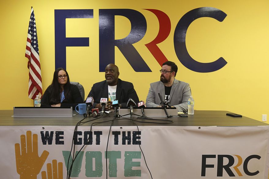 Left to Right, Jessica Younts, Florida Rights Restoration Coalition, director of operations; Desmond Meade, executive director Florida Rights Restoration Coalition; and Neil Volz, Florida Rights Restoration Coalition, political director— The Florida Rights Restoration Coalition holds a press conference to discuss a vote-registration campaign, on Tuesday, July 2, 2019. The Coalition helped lead efforts to pass a constitutional amendment aimed at restoring voting rights of felons. (Ricardo Ramirez Buxeda/Orlando Sentinel via AP)
