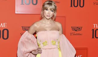 FILE - This April 23, 2019 file photo shows Taylor Swift at the Time 100 Gala, celebrating the 100 most influential people in the world in New York. Scooter Braun’s Ithaca Holdings acquired Big Machine Label Group, home to Swift’s first six albums, including the Grammy winners for album of the year, 2008’s “Fearless” and 2014’s “1989.” (Photo by Charles Sykes/Invision/AP, File)