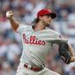 Philadelphia Phillies starting pitcher Aaron Nola works in the first inning of the team&#x27;s baseball game against the Atlanta Braves on Tuesday, July 2, 2019, in Atlanta. (AP Photo/John Bazemore)