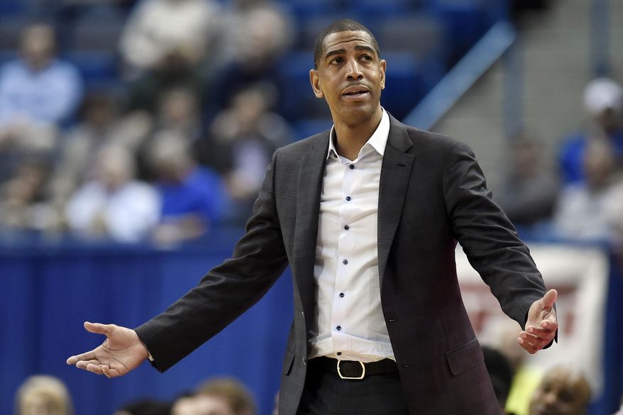 In this Feb. 15, 2018, file photo, Connecticut head coach Kevin Ollie reacts during the second half an NCAA college basketball game against Tulsa in Hartford, Conn. UConn will find out what penalties it faces for violations of NCAA rules in its basketball program under former coach Kevin Ollie. The NCAA Division I Committee on Infractions plans to release its report Tuesday, July 2, 2019. (AP Photo/Jessica Hill, File) **FILE**