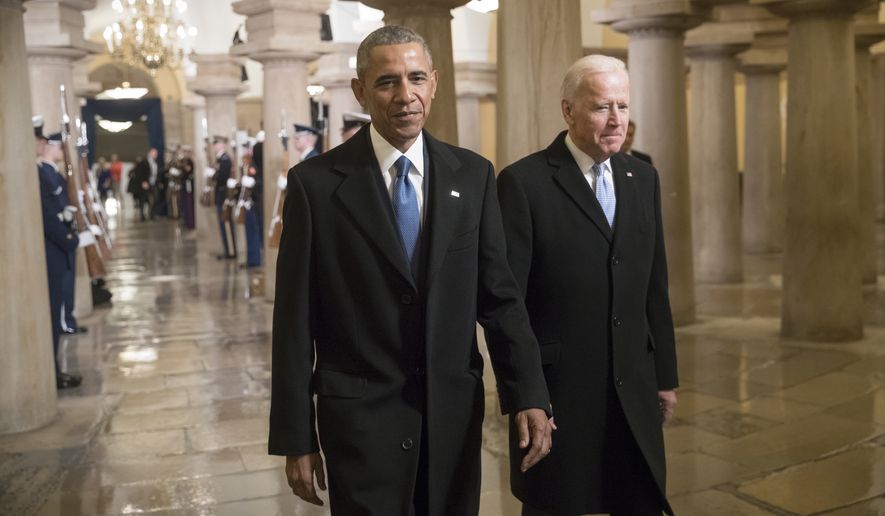 President Barack Obama and Vice President Joe Biden walk through the Crypt of the Capitol in Washington, Friday, Jan. 20, 2017, for Donald Trump&#39;s inauguration ceremony. (AP Photo/J. Scott Applewhite, Pool) ** FILE **