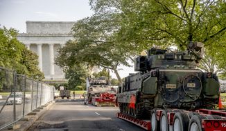 Two Bradley Fighting Vehicles are parked nearby the Lincoln Memorial for President Donald Trump&#39;s &quot;Salute to America&quot;event honoring service branches on Independence Day, Tuesday, July 2, 2019, in Washington. Trump is promising military tanks along with &amp;quot;Incredible Flyovers &amp;amp; biggest ever Fireworks!&amp;quot; for the Fourth of July. (AP Photo/Andrew Harnik)