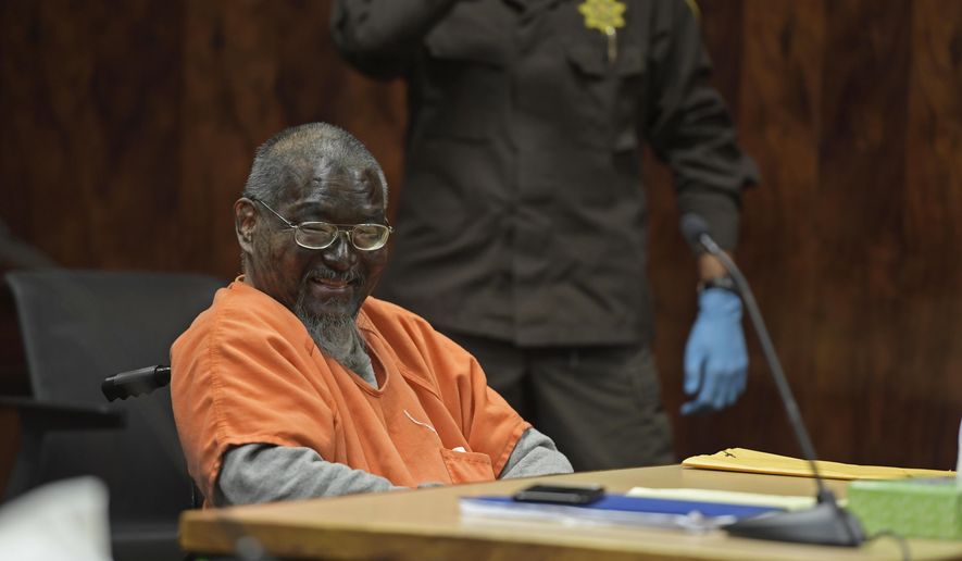 In this Monday, July 1, 2019, photo, Mark Char appears in court, in Honolulu, with his face painted black. Char was sentenced to life in prison with the possibility of parole for attempted murder and assault for stabbing three people on a freeway in August 2016. (Bruce Asato/Honolulu Star-Advertiser via AP)