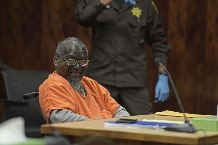 In this Monday, July 1, 2019, photo, Mark Char appears in court, in Honolulu, with his face painted black. Char was sentenced to life in prison with the possibility of parole for attempted murder and assault for stabbing three people on a freeway in August 2016. (Bruce Asato/Honolulu Star-Advertiser via AP)