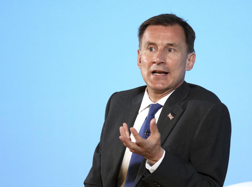 Conservative party leadership contender Jeremy Hunt speaks during a party leadership hustings in Belfast, Northern Ireland Tuesday July 2, 2019. The two contenders, Jeremy Hunt and Boris Johnson face election by party member of Britain's Conservative Party with the winner replacing Prime Minister Theresa May as party leader and UK prime minister. (AP Photo/Peter Morrison)
