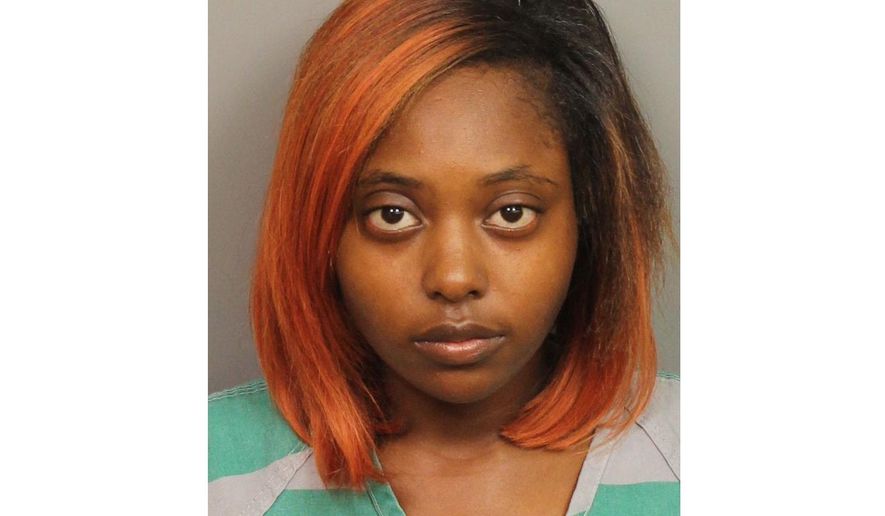 FILE - This file photo provided by Jefferson County Sheriff's Office shows Marshae Jones. An An Alabama district attorney said Wednesday, July 3, 2019, she is dropping the manslaughter charge against Jones, a woman who lost her fetus when she was shot during a fight. (Jefferson County Sheriff's Office via AP, File)