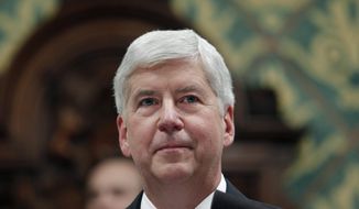 In this Jan. 23, 2018, file photo, former Michigan Gov. Rick Snyder delivers his State of the State address at the state Capitol in Lansing, Mich. Snyder says he has turned down a fellowship at Harvard University following social media backlash over his administration&#39;s role in the Flint water crisis. He tweeted Wednesday, July 3, 2019, that being a senior research fellow would have been too &#39;disruptive&#39; because of &#39;our current political environment and its lack of civility.&#39; (AP Photo/Al Goldis, File) **FILE**