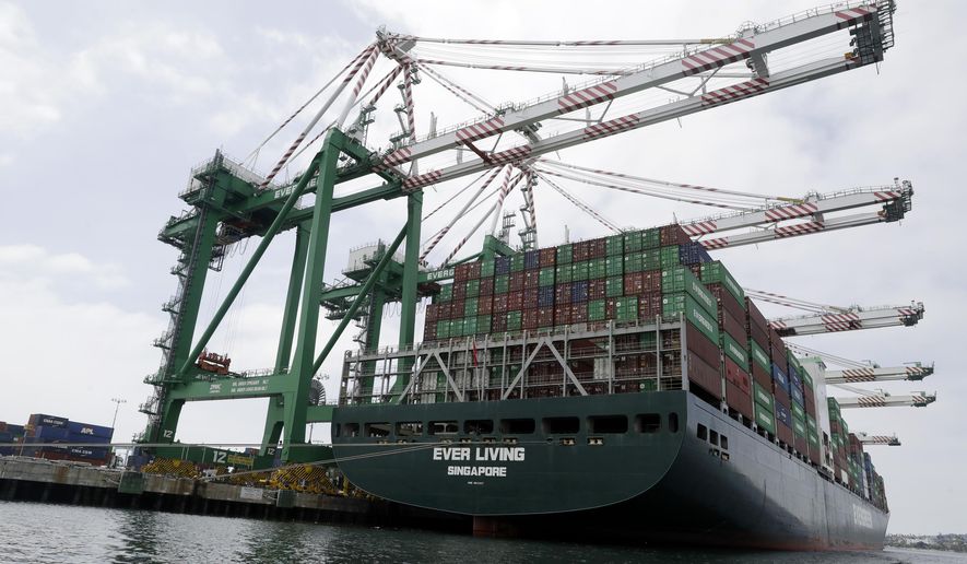 FILE - In this June 19, 2019, file photo a cargo ship is docked at the Port of Los Angeles in Los Angeles. On Wednesday, July 3, the Commerce Department reports on the U.S. trade gap for May. (AP Photo/Marcio Jose Sanchez, File)