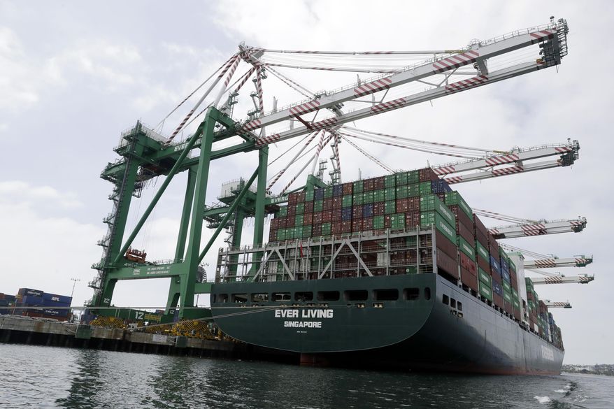 FILE - In this June 19, 2019, file photo a cargo ship is docked at the Port of Los Angeles in Los Angeles. On Wednesday, July 3, the Commerce Department reports on the U.S. trade gap for May. (AP Photo/Marcio Jose Sanchez, File)