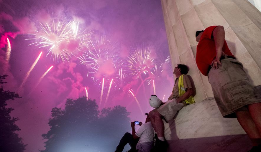 Fireworks seen from the Lincoln Memorial explode over the Potomac River for Independence Day, Thursday, July 4, 2019, in Washington. (AP Photo/Andrew Harnik)  **FiLE**