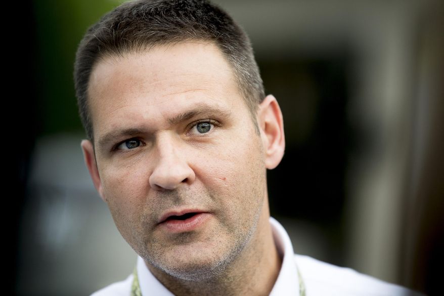 FILE - In this Wednesday, June 12, 2019, file photo, All Scripture Baptist Church Pastor Grayson Fritts speaks with the media at the church's Cherry Street location in Knoxville, Tenn. The former Knox County detective, who drew national attention for a sermon calling for the execution of gay people, had been posting similar hate-filled sermons since he was ordained in February 2018. (Calvin Mattheis//Knoxville News Sentinel via AP, File)