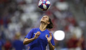 United States&#x27; Carli Lloyd warms up before the Women&#x27;s World Cup semifinal soccer match between England and the United States, at the Stade de Lyon outside Lyon, France, Tuesday, July 2, 2019. (AP Photo/Francisco Seco)
