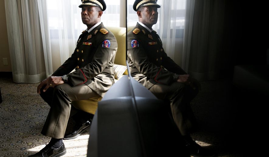 In this July 2, 2019, photo, Gen. Manuel Cristopher, former head of Venezuela's feared SEBIN intelligence agency, poses for a portrait in Washington. In a show of nerve, he betrayed Venezuela President Nicolas Maduro, the man he met with almost every day, and secretly plotted with his enemies to launch a short-lived military uprising that Cristopher says was tantalizingly close to ousting the embattled leader. (AP Photo/Jacquelyn Martin)