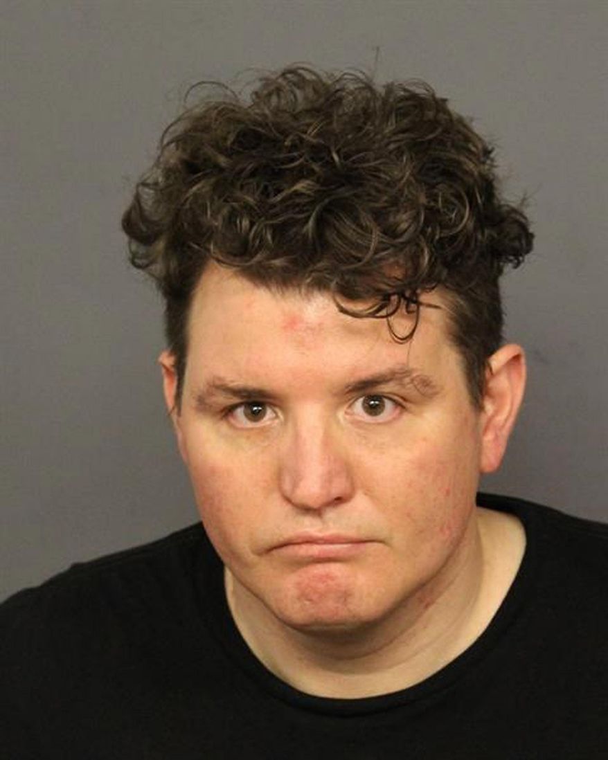 This July 3, 2019, photo provided by the Denver Police Department, shows Joshua Hensley, 38, a guard at a Colorado women's prison who was arrested Wednesday on suspicion of attempted pimping and patronizing a prostitute. Investigators believe he was trying to coerce at least two women to work as prostitutes for him, court records state. (Denver Police Department via AP)
