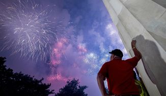 Fireworks seen from the Lincoln Memorial explode over the Potomac River for Independence Day, Thursday, July 4, 2019, in Washington. (AP Photo/Andrew Harnik) ** FILE **