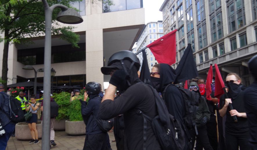 Protestors clash with police as Antifa tries to rush the police line into the Demand Free Speech Rally in downtown Washington, D.C., on July 6, 2019. (Moss Brennan/The Washington Times)