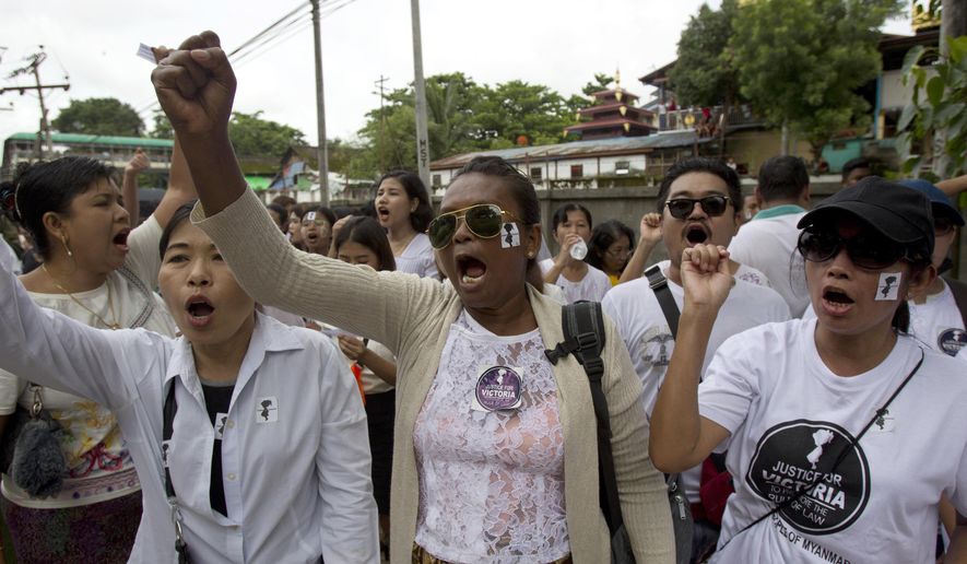 People shout slogans as they march during a protest in Yangon, Myanmar Saturday, July 6, 2019. Hundreds of people marched to Myanmar’s Central Investigation Department on Saturday in Yangon to demand justice for a 2-year-old girl who was allegedly raped in the country’s capital in May. (AP Photo/Thein Zaw)