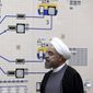 In this Jan. 13, 2015, file photo released by the Iranian President&#39;s Office, President Hassan Rouhani visits the Bushehr nuclear power plant just outside of Bushehr, Iran. Iran announced Sunday, July 7, 2019 it will raise its enrichment of uranium, breaking another limit of its faltering 2015 nuclear deal with world powers and further heightening tensions between Tehran and the U.S. (AP Photo/Iranian Presidency Office, Mohammad Berno, File)