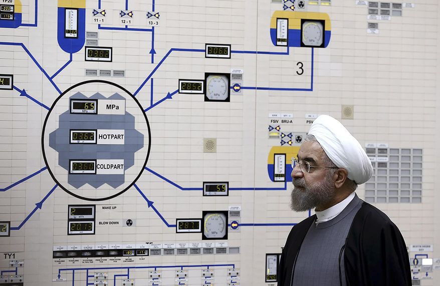 In this Jan. 13, 2015, file photo released by the Iranian President's Office, President Hassan Rouhani visits the Bushehr nuclear power plant just outside of Bushehr, Iran. Iran announced Sunday, July 7, 2019 it will raise its enrichment of uranium, breaking another limit of its faltering 2015 nuclear deal with world powers and further heightening tensions between Tehran and the U.S. (AP Photo/Iranian Presidency Office, Mohammad Berno, File)