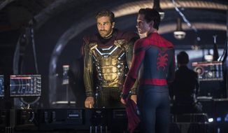 This image released by Sony Pictures shows Jake Gyllenhaal, left, and Tom Holland in a scene from &amp;quot;Spider-Man: Far From Home.&amp;quot; (Jay Maidment/Columbia Pictures/Sony via AP)