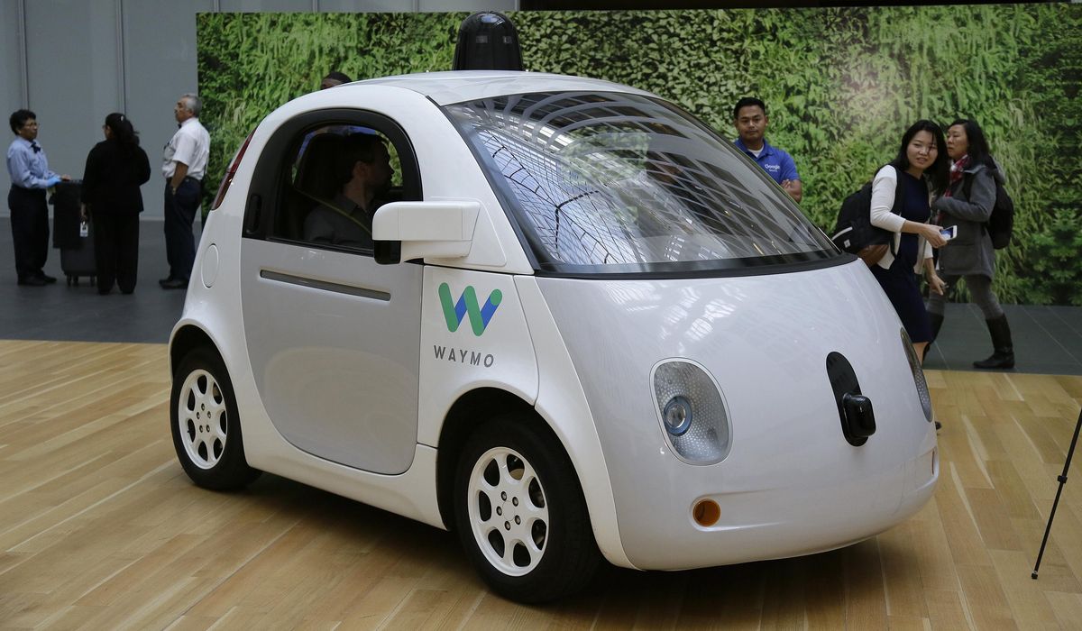 NextImg:Waymo driverless car vandalized and scorched by mob in San Francisco