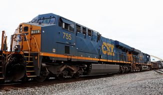 CSX Transportation is one of seven Class 1 freight train firms with annual operating revenues of $450 million or more. Despite a report of longer trains creating lengthy railroad crossings, CSX states that longer trains are a &quot;tried and proven way to increase efficiency.&quot; (ASSOCIATED PRESS)