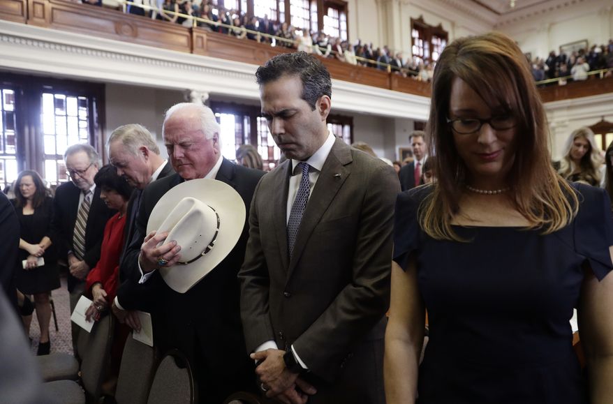 A number of legislative bodies, including both chambers of Congress, regularly open business with a prayer. (Associated Press) ** FILE **