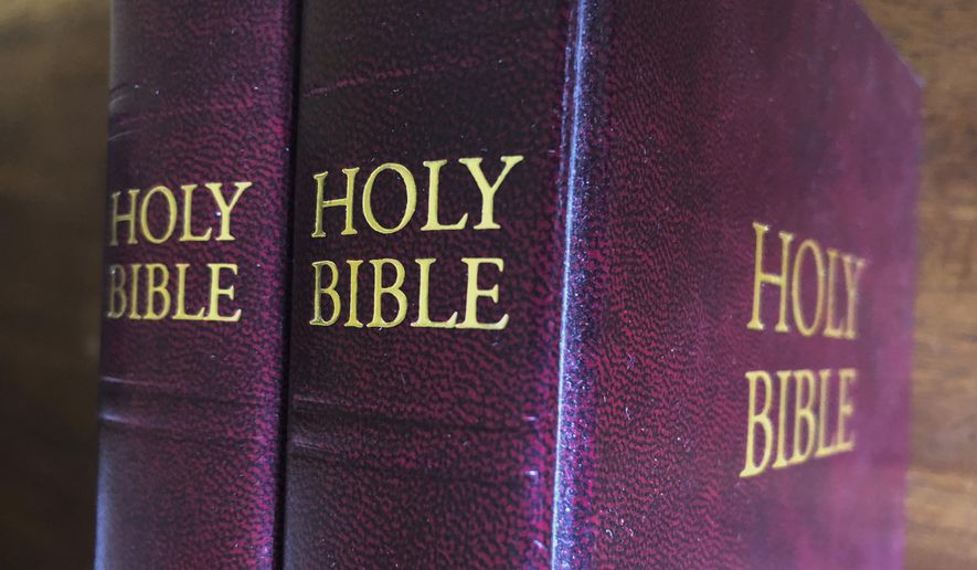 In this July 5, 2019, file photo, Bibles are displayed in Miami. (AP Photo/Marta Lavandier) ** FILE **