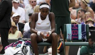 United States&#x27; Cori &amp;quot;Coco&amp;quot; Gauff is dejected after losing to Romania&#x27;s Simona Halep in a women&#x27;s singles match against on day seven of the Wimbledon Tennis Championships in London, Monday, July 8, 2019. (AP Photo/Kirsty Wigglesworth) **FILE**