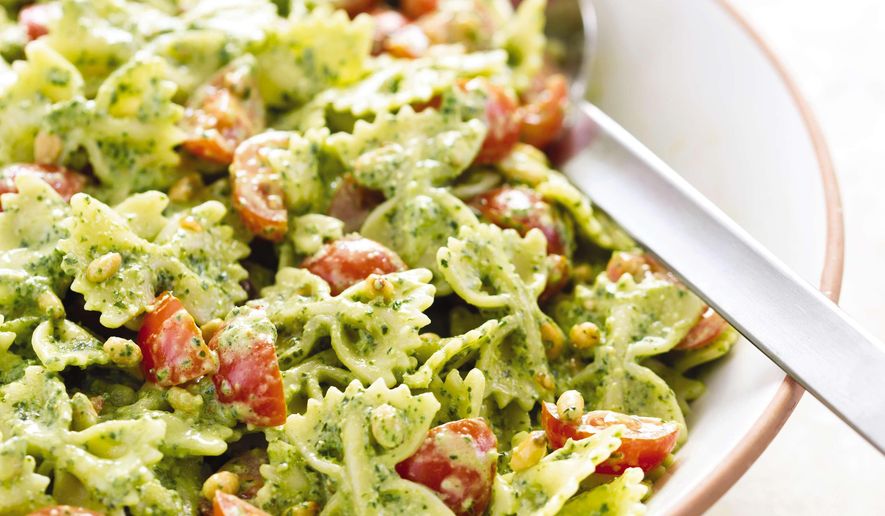 This undated photo provided by America's Test Kitchen in June 2019 shows Pasta Salad with Pesto in Brookline, Mass. This recipe appears in "The Complete Make-Ahead Cookbook." (Daniel J. van Ackere/America's Test Kitchen via AP)