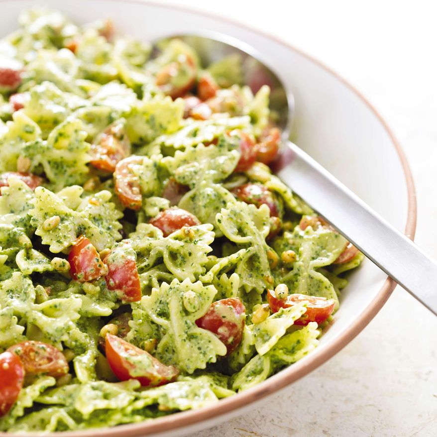This undated photo provided by America's Test Kitchen in June 2019 shows Pasta Salad with Pesto in Brookline, Mass. This recipe appears in "The Complete Make-Ahead Cookbook." (Daniel J. van Ackere/America's Test Kitchen via AP)