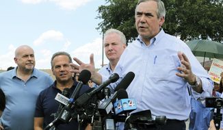 FILE - In this June 17, 2018, file photo, U.S. Sen. Jeff Merkley, from right, from Oregon, speaks to the media along with U.S. Sen. Chris Van Hollen, center, D-Md., U.S. Rep. David Cicilline, D-R.I., and U.S. Rep. Mark Pocan, D-Wis., in front of the U.S. Customs and Border Protection&#39;s Rio Grande Valley Sector&#39;s Centralized Processing Center in McAllen, Texas. A book by Sen. Merkley on the treatment of refugees at the Texas border is coming next month. The publisher is calling “America Is Better Than This” a “cry of outrage.” Merkley made headlines when he traveled to Texas in 2018 and streamed his efforts to gain entry to a migrant facility. (Joel Martinez/The Monitor via AP, File)