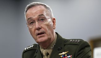 In this May 1, 2019, file photo, Joint Chiefs of Staff Chairman Gen. Joseph Dunford testifies during a House Appropriations subcommittee on budget hearing on Capitol Hill in Washington.  (AP Photo/Jacquelyn Martin, File)  **FILE**