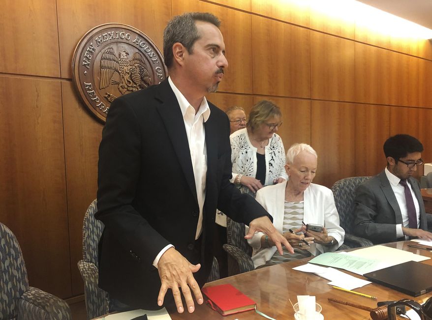 In this photo taken Monday, July 8, 2019, New Mexico Rep. Antonio "Moe" Maestas speaks to reporters following a legislative hearing in Santa Fe, N.M. Maestas, D-Albuquerque, is among lawmakers pushing for changes to New Mexico's parole system. (AP Photo/Mary Hudetz)