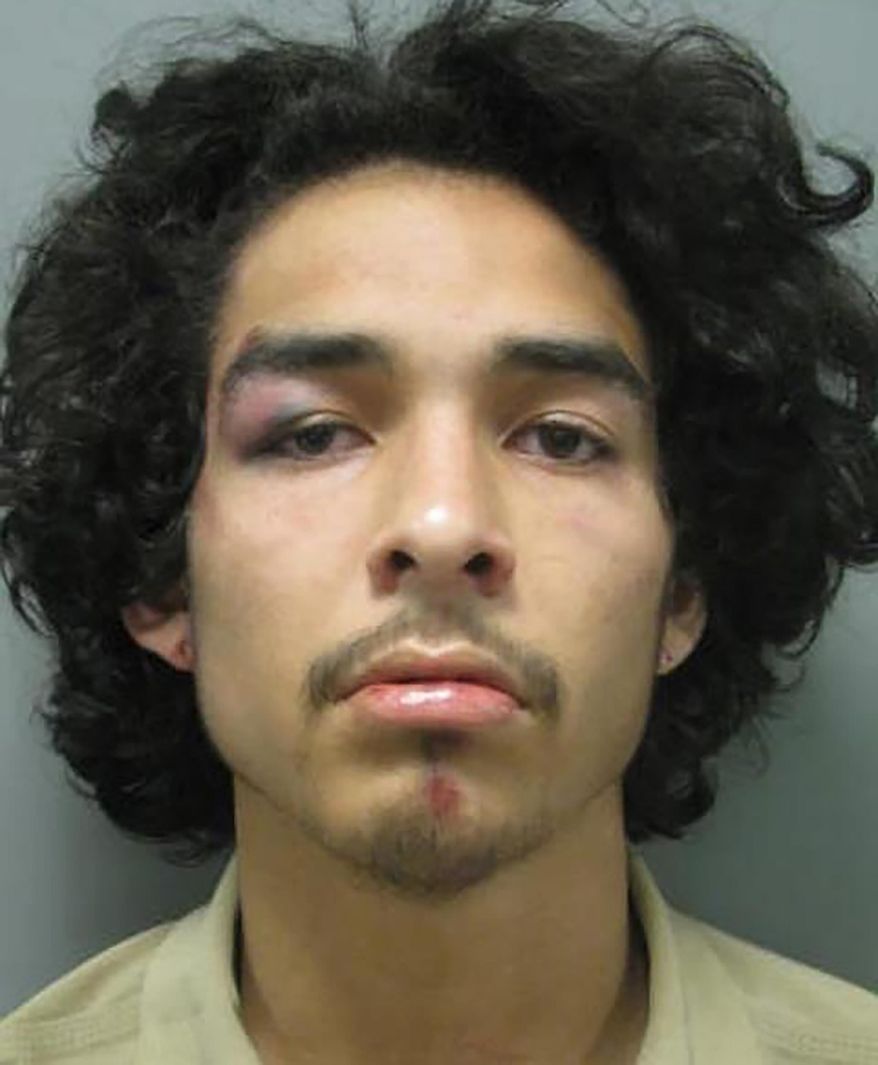 FILE - This Wednesday, July 3, 2019 photo from the Montgomery County Police Department shows Arnaldo Pesoa. Maryland prosecutors have filed an assault charge against a Montgomery County police officer accused of kneeing a handcuffed man's head into a sidewalk outside a restaurant during a videotaped arrest. Court documents filed Tuesday, July 9, 2019, charge Officer Kevin Joseph Moris with second-degree assault and misconduct in office in the July 3 arrest of Pesoa. (Montgomery County Police Department via AP)