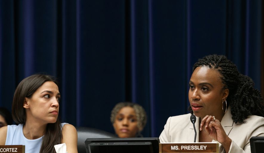 Rep. Alexandria Ocasio-Cortez, D-N.Y., left, listens as Rep. Ayanna Pressley, D-Mass., tells Yazmin Ju&amp;#225;rez, that she did not cause the death of her daughter Mariee, 1, who died after being released from detention by U.S. Immigration and Customs Enforcement (ICE), as Ju&amp;#225;rez testified at a House Oversight Civil Rights and Civil Liberties subcommittee hearing on treatment of immigrant children at the southern border, Wednesday, July 10, 2019, on Capitol Hill in Washington. (AP Photo/Jacquelyn Martin)