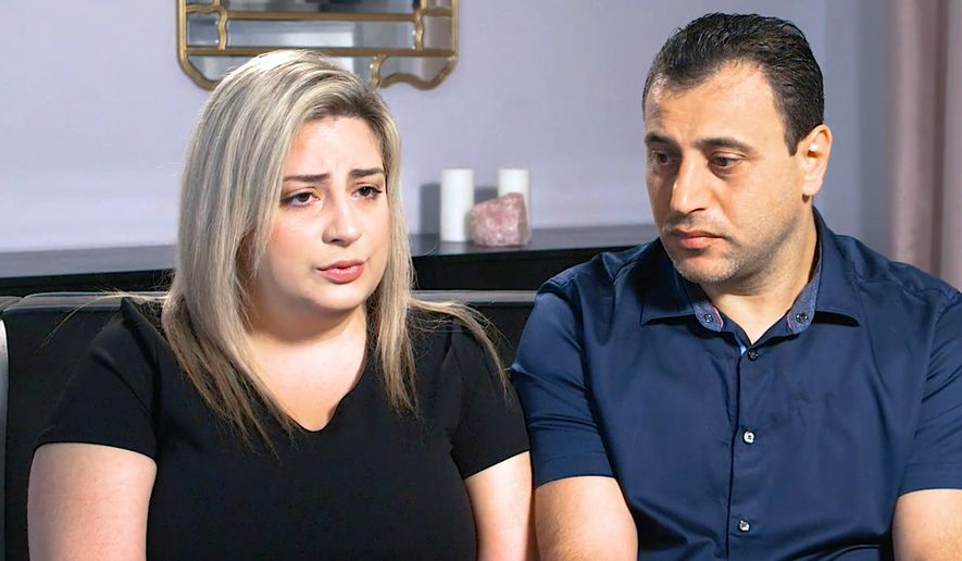 In this Monday, July 8, 2019, photo taken from video provided by Peiffer Wolf Carr & Kane, Anni, left, and Ashot Manukyan describe their lawsuit against a fertility clinic during an interview in Los Angeles. The Southern California couple claim their embryo was mistakenly implanted in a New York woman, who gave birth to their son as well as a second boy belonging to another couple. The lawsuit by the Manukyans describes an alleged in vitro fertilization mix-up by CHA Fertility Center in Los Angeles that involves three separate couples. (Peiffer Wolf Carr & Kane via AP)